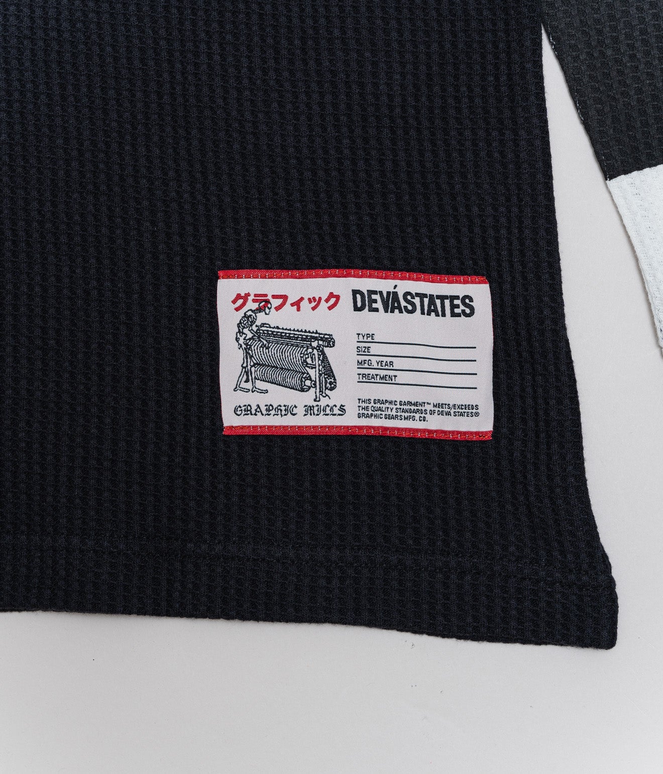 DEVÁ STATES "GENESIS Waffle Knitted Sweater" Black/White - WEAREALLANIMALS